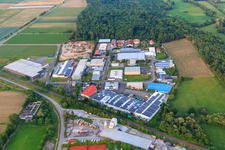 Große Ahlmühle industrial estate beyond the railway from the west in Rohrbach in the state Rhineland-Palatinate, Germany