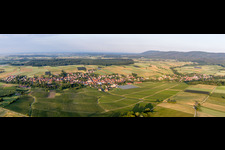 Panoramic perspective Village - view on the edge of agricultural fields and farmland in Steinseltz in Grand Est, France
