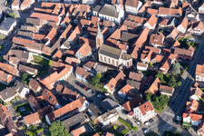 Aerial view of Church building Eglise Catholique Saint-Laurent in Woerth in Grand Est, France
