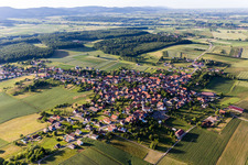 Aerial photograpy of Village - view on the edge of agricultural fields and farmland in Schoenenbourg in Grand Est, France