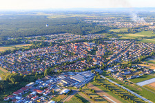 Aerial view of Two hot air balloons over the village in Dudenhofen in the state Rhineland-Palatinate, Germany