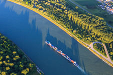 Aerial view of Cargo ship on the Rhine in the evening in the district Rheinhausen in Oberhausen-Rheinhausen in the state Baden-Wuerttemberg, Germany