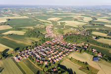Village - view on the edge of agricultural fields and farmland in Neewiller-pres-Lauterbourg in Grand Est, France