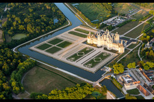 Aerial view of Channels and Building complex in the park of the castle Schloss Chambord in Chambord in Centre-Val de Loire, France