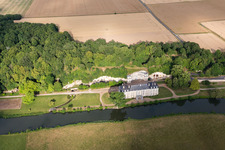 Oblique view of Building and castle park systems of castle Chateau de Rochambeau in Thore-la-Rochette in Centre-Val de Loire, France