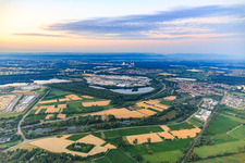 Overview of the Industriepark Wörth GmbH in the morning from the northwest across the lake Kiefer Rathjen with Mercedes-Benz Trucks in Wörth am Rhein in the state Rhineland-Palatinate, Germany