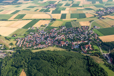 Village - view on the edge of agricultural fields and farmland in Moenchsdeggingen in the state Bavaria, Germany