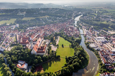Aerial photograpy of Complex of buildings of the monastery Heilig Kreuz in front of Ried island in Donauwoerth in the state Bavaria, Germany