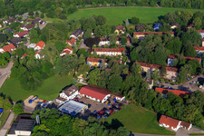 Aerial view of Oberholzner gas station with scrap car storage area in Donauwörth in the state Bavaria, Germany