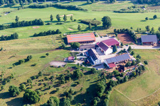 Farm near golf club on the edge of cultivated fields in the district Schiesserhof in Donauwoerth in the state Bavaria, Germany