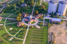 Aerial view of Two large silos of former Südzucker at the Eremitage Waghäuse in the evening light in Waghäusel in the state Baden-Wuerttemberg, Germany