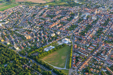 Aerial photograpy of View from the northeast with volunteer fire department Hockenheim and Schmitt vegetable farm at the P1 parking lot of the Hockenheimring in Hockenheim in the state Baden-Wuerttemberg, Germany