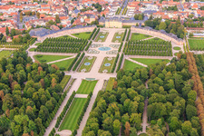 Oblique view of Arion fountain in the center of the Schwetzingen Palace Gardens and deer group - sculptures with fountain in Schwetzingen in the state Baden-Wuerttemberg, Germany