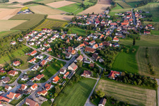 Village - view on the edge of agricultural fields and farmland in Voellkofen in the state Baden-Wurttemberg, Germany