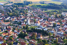 Aerial view of View of the town from the north with the Roman Catholic Church in Ostrach in the state Baden-Wuerttemberg, Germany