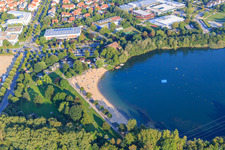 Oblique view of Beach of the bathing lake Bensheim in the evening in Bensheim in the state Hesse, Germany