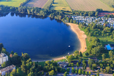 Beach of the Wiesensee outdoor pool from the south in Hemsbach in the state Baden-Wuerttemberg, Germany