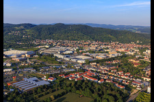 City view on the edge of the Odenwald from the southwest with Freudenberg Sealing Technologies in Weinheim in the state Baden-Wuerttemberg, Germany