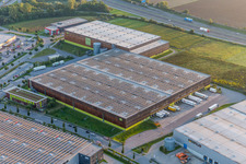 Aerial view of Building complex and grounds of the logistics center of Verteilzentrums von Alnatura in Lorsch in the state Hesse, Germany
