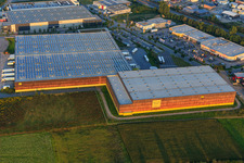 Aerial view of Alnatura distribution center with wooden facade in Lorsch in the state Hesse, Germany