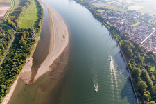 Sandbank in front of the Maulbeeraue on the banks of the Rhine with a pleasure boat in the district Rheindürkheim in Worms in the state Rhineland-Palatinate, Germany