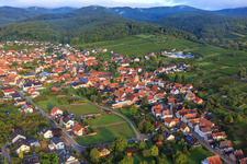 Unterdorfstraße with two churches in Oberotterbach in the state Rhineland-Palatinate, Germany