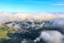View of the town beyond the B10 under clouds from the southeast in Siebeldingen in the state Rhineland-Palatinate, Germany