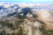 Overview of the place under clouds from the north in Albersweiler in the state Rhineland-Palatinate, Germany