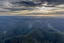 Forest and mountain scenery of Pfaelzerwalds at sunset in Wilgartswiesen in the state Rhineland-Palatinate, Germany