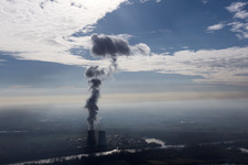 Aerial view of Clouds over the cooling tower of the NPP nuclear power plant of EnBW Kernkraft GmbH, Kernkraftwerk Philippsburg on an Island in the river rhine in Philippsburg in the state Baden-Wurttemberg, Germany