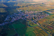Aerial view of Wine-growing village from the west between autumn-colored vineyards in Oberotterbach in the state Rhineland-Palatinate, Germany