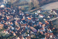Aerial view of Protestantic Church building in the center of a circle of houses in the village of in Dossenheim-sur-Zinsel in Grand Est, France