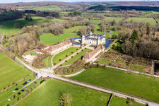 Water castle Château Sully in Burgundy in Sully in the state Saone et Loire, France from the plane