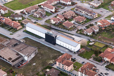Aerial view of Warehouse complex-building in the industrial area of Prosciuttificio Friulano und Leoncini Prosciutti in San Daniele del Friuli in Friuli-Venezia Giulia, Italy