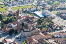 Church tower and tower roof at the church building of Chiesa delle Sante Perpetua e Felicita in Fiume Veneto in Friuli-Venezia Giulia, Italy