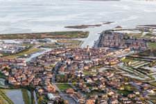 Water surface at the seaside mole of in Marano Lagunare in Friuli-Venezia Giulia, Italy