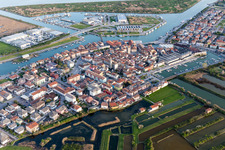 Aerial view of Water surface at the seaside mole of in Marano Lagunare in Friuli-Venezia Giulia, Italy