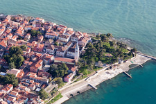 Pleasure boat marina with docks and moorings on the shore area of the Adriatic sea and old town of Novigrad in Istrien - Istarska zupanija, Croatia