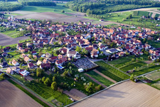 Oblique view of Village - view on the edge of agricultural fields and farmland in Schoenenbourg in Grand Est, France