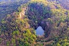 Basalt lake in the Pechsteinkopf nature reserve at the Old Forster basalt quarry in Forst an der Weinstraße in the state Rhineland-Palatinate, Germany from above