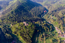 Castle of the fortress Burg Berwartstein with mit Paraglider in Erlenbach bei Dahn in the state Rhineland-Palatinate, Germany