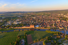 Oblique view of City view from the west with the warehouse on the Weser bank of RL Rieke GmbH & Co. KG in Holzminden in the state Lower Saxony, Germany