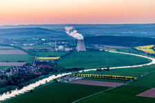 Building remains of the reactor units and facilities of the NPP nuclear power plant Grohnde on the river Weser during sunset in Grohnde in the state Lower Saxony, Germany