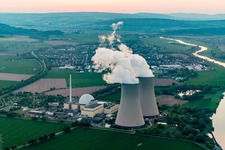Aerial view of Building remains of the reactor units and facilities of the NPP nuclear power plant Grohnde on the river Weser during sunset in Grohnde in the state Lower Saxony, Germany