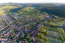 Location view of the streets and houses of residential areas in the valley landscape surrounded by mountains in Stahle in the state North Rhine-Westphalia, Germany