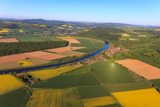View of the town on the Weser riverbank from the east in Brevörde in the state Lower Saxony, Germany