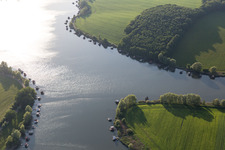 Aerial view of Puttelange-aux-Laxs, étange biscornu in Grundviller in the state Moselle, France