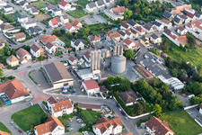 Aerial view of Silo for storage of grains from the mill Deller Muehle in Hochdorf-Assenheim in the state Rhineland-Palatinate, Germany