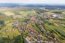 Aerial view of Village view on the edge of agricultural fields and land in Mudau in the state Baden-Wurttemberg, Germany