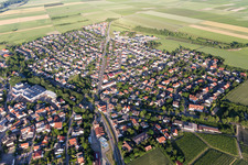Aerial view of Agricultural land and field borders surround the settlement area of the village in Westhofen in the state Rhineland-Palatinate, Germany